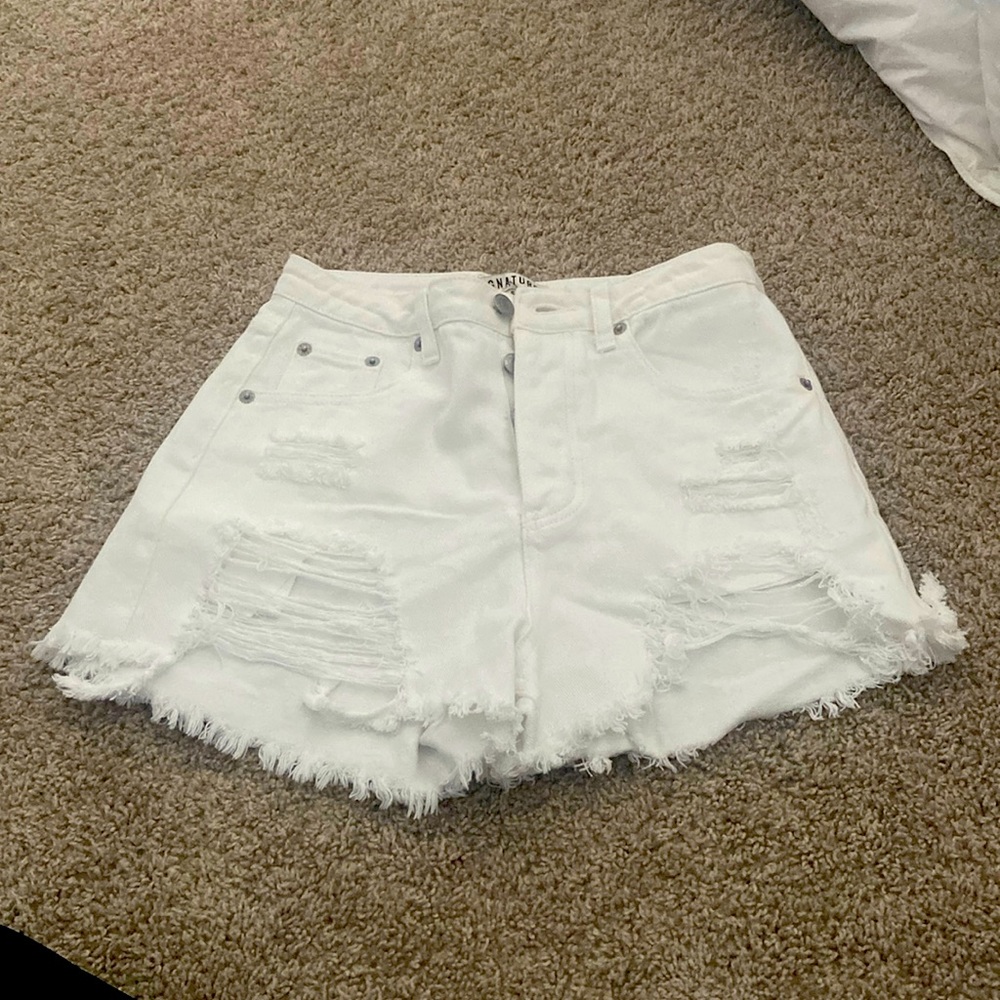 White high rise distressed jean shorts